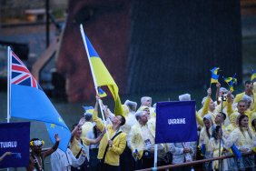 Початок Олімпійських ігор-2024: Париж святкує під дощем і світлом олімпійських вогнів